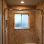 Bathrooms - Granite Shower at Cole Street Property by The Beautiful Home Company