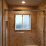 Bathrooms - Granite Shower at Cole Street Property by The Beautiful Home Company