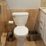 Bathrooms - Granite Shower, Floor and Counter Top at Cole Street Property by The Beautiful Home Company