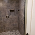 Bathrooms - Granite Shower at Susan Hill Property by The Beautiful Home Company